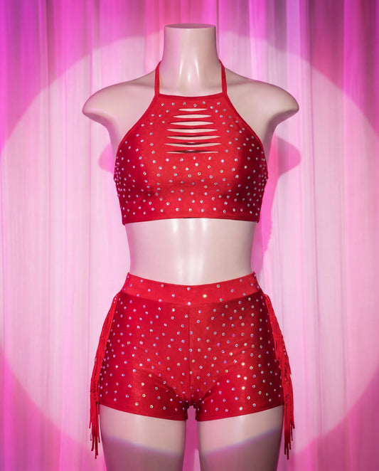 Front view of Diabla red rhinestone stripper shorts set with halter crop top and side fringe
