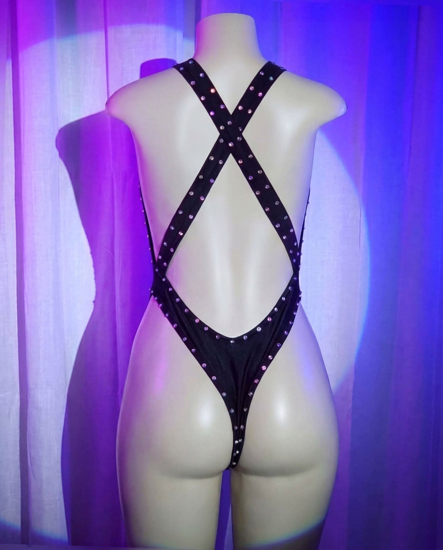 Back view of Dreamy black rhinestone stripper bodysuit with cross-back straps
